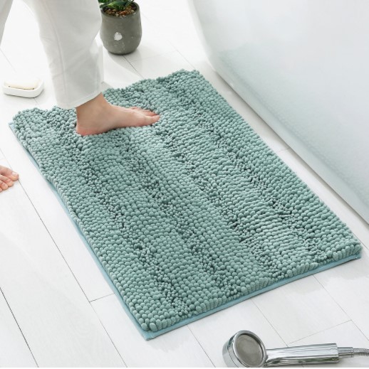 Soft grey furry bathroom mat